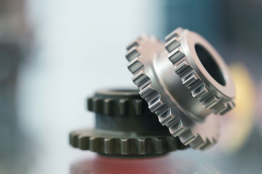 service-02 two-metal-gears-stacked-on-a-surface-lh0yohvn-ic